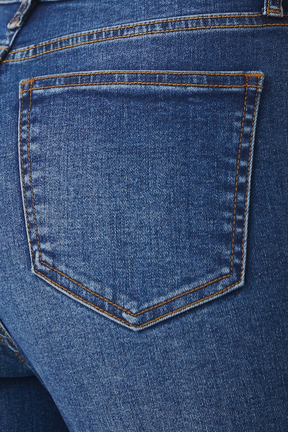 Jeansy damskie slim z efektem sprania kolor granatowy granatowy RW24-SJD050