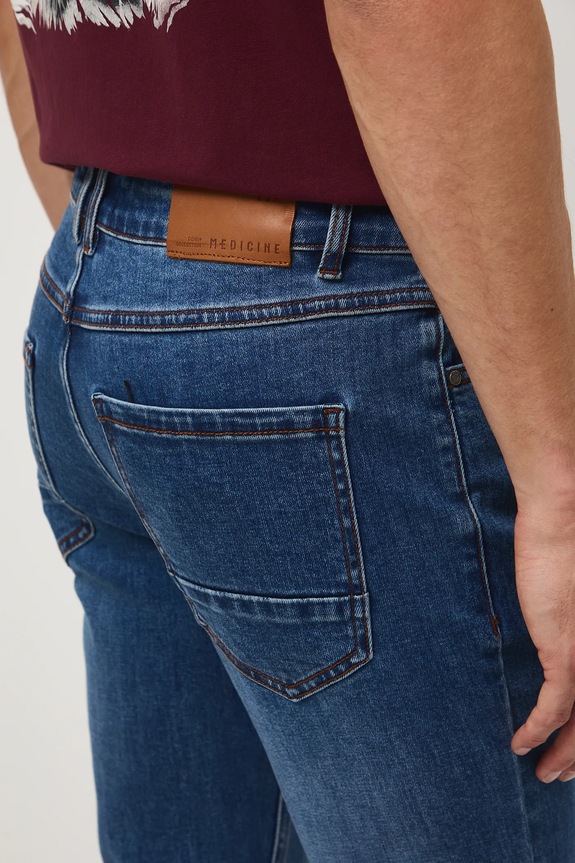 Jeansy męskie slim z efektem sprania granatowy RW25-SJM305