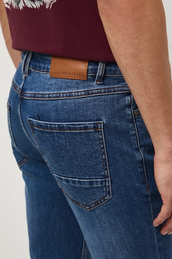 Jeansy męskie slim z efektem sprania granatowy RW25-SJM305