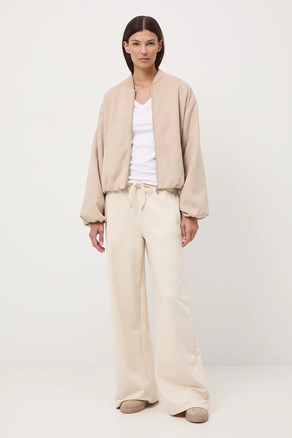 Spodnie dresowe damskie wide leg z elastanem beżowy RW25-SPD307