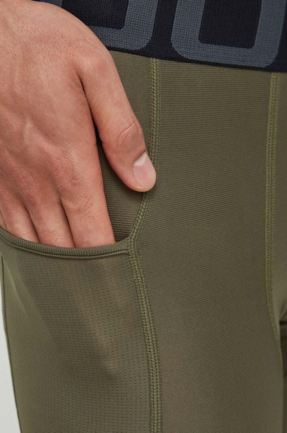 Oblečenie Tréningové legíny Under Armour 1361586 zelená