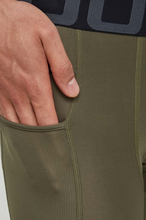 Oblečenie Tréningové legíny Under Armour 1361586 zelená