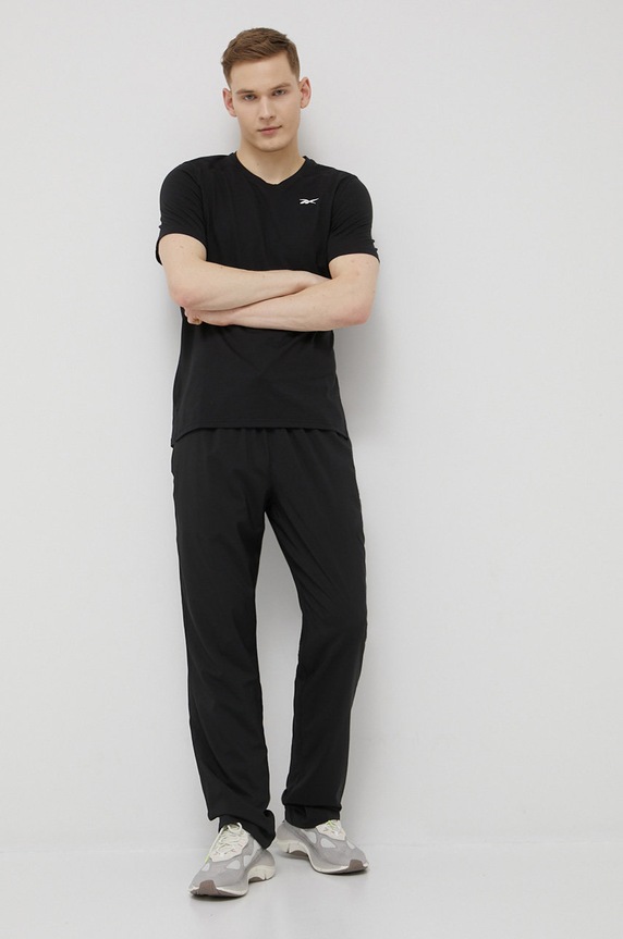 Reebok spodnie ID TRAIN FP9167 czarny AW22