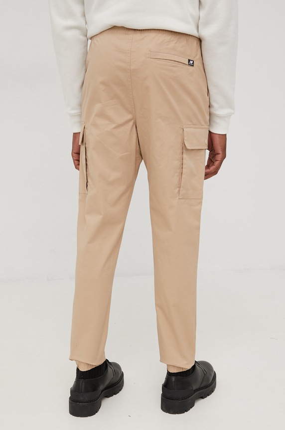 Îmbrăcăminte New Balance pantaloni MP13501INC MP13501INC bej