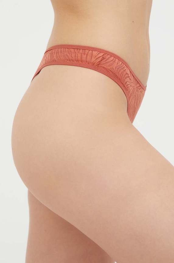 Calvin Klein Underwear stringi 000QF6878E.PPYX pomarańczowy AW23