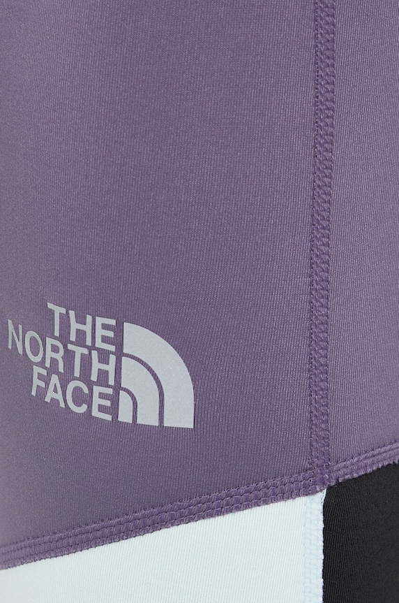 The North Face legginsy do biegania fioletowy NF0A7SXKIDN1
