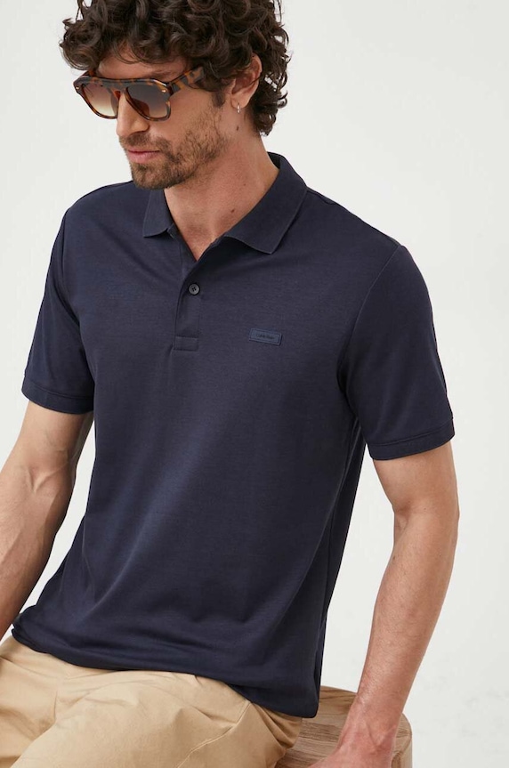 Βαμβακερό μπλουζάκι πόλο Calvin Klein κανονικό σκούρο μπλε K10K111657.PPYX