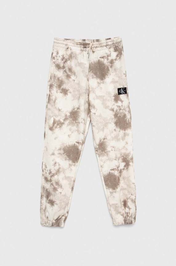 Calvin Klein Jeans spodnie dresowe dziecięce aplikacja beżowy IB0IB01602.PPYX