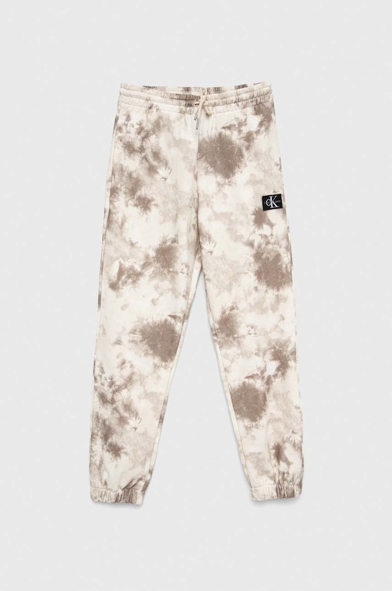 Calvin Klein Jeans spodnie dresowe dziecięce aplikacja beżowy IB0IB01602.PPYX