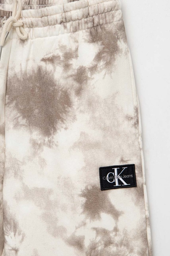Chłopiec Calvin Klein Jeans spodnie dresowe dziecięce IB0IB01602.PPYX beżowy