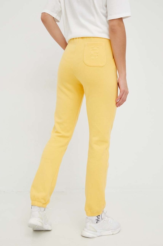 Odzież Billabong spodnie dresowe bawełniane X SMILEY ABJNP00343 żółty