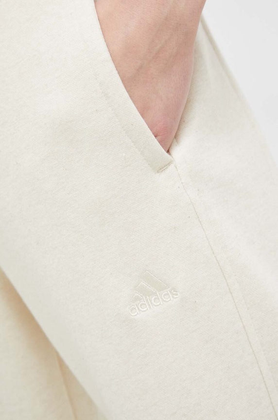 Oblečenie Tepláky adidas IC6460 béžová