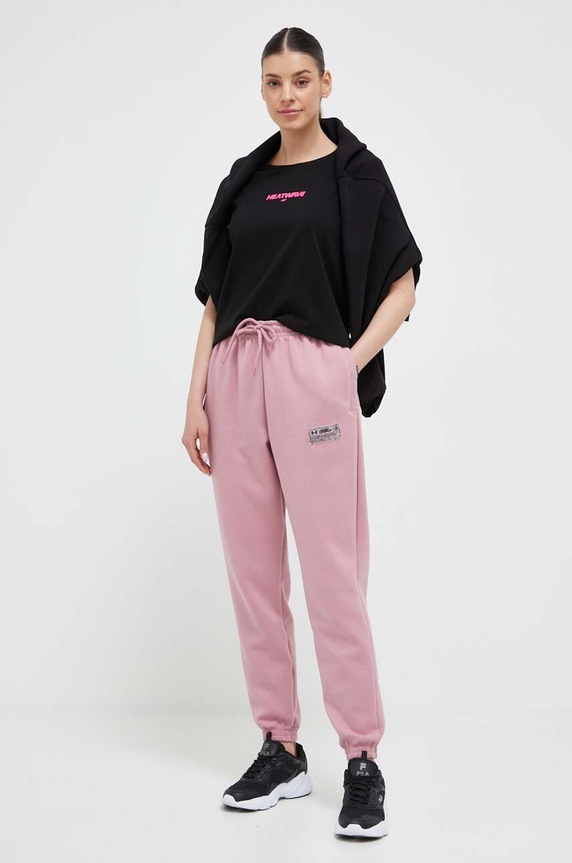 Under Armour spodnie dresowe 1377175.D różowy SS23