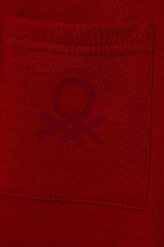 Chłopiec United Colors of Benetton spodnie dresowe bawełniane dziecięce 3J70GF010.P.SEASONAL czerwony