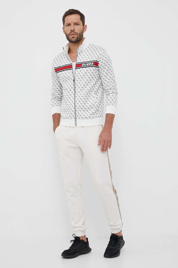 Guess spodnie dresowe MICKEY Z2YB09.KB3P2 beżowy SS26