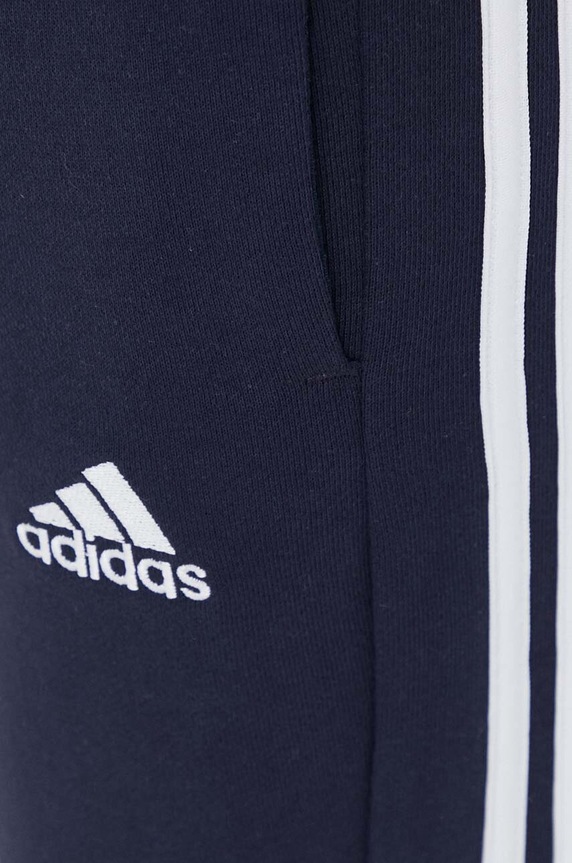Bavlnené tepláky adidas tmavomodrá IC9406