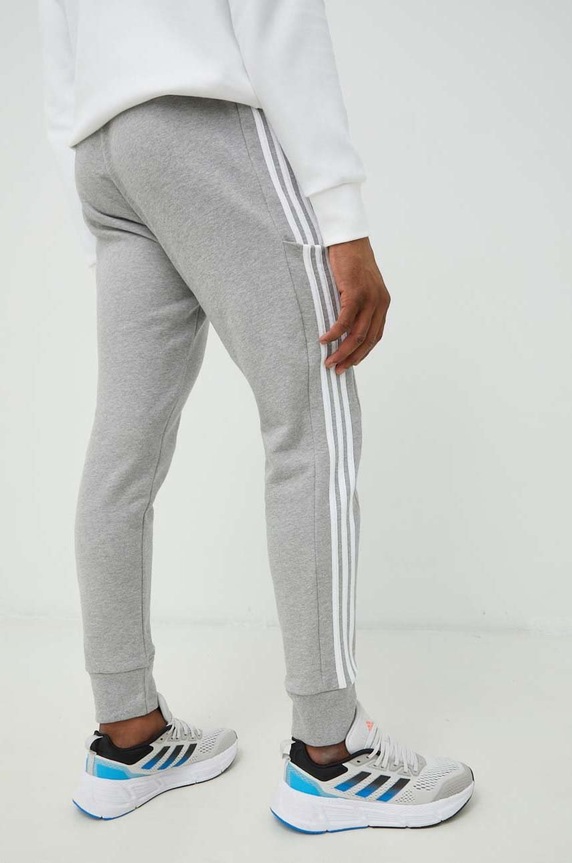Odzież adidas spodnie dresowe bawełniane Essentials IC9407 szary