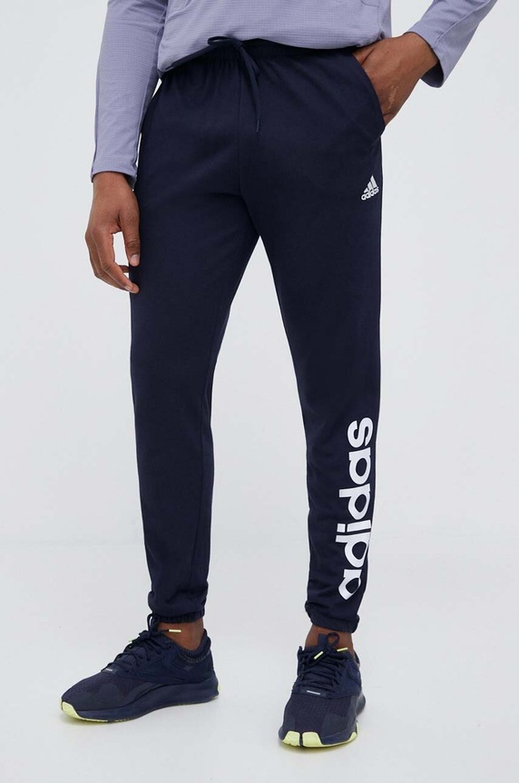 Tréningové nohavice adidas Essentials pletenina tmavomodrá IC0056