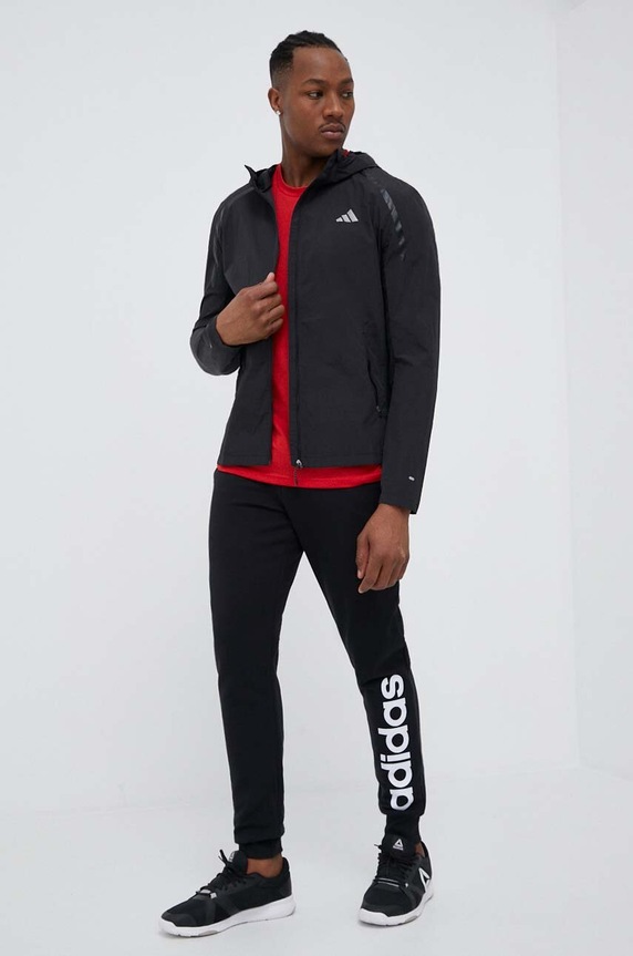 Bavlněné tepláky adidas IC0063 černá SS23