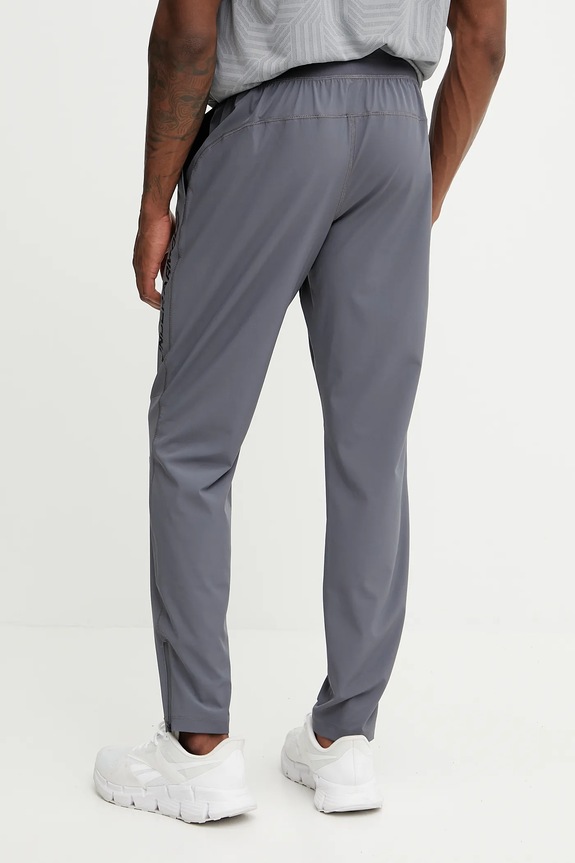 Ruházat Under Armour futónadrág Storm 1376800 szürke