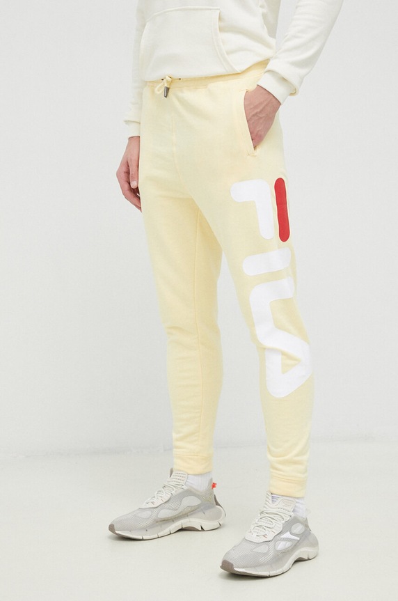 Fila spodnie dresowe Bronte żółty FAU0069.SS23