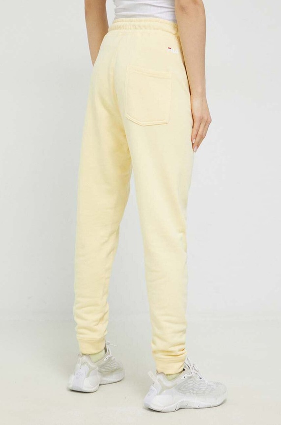 Fila spodnie dresowe Bronte FAU0069.SS23 żółty