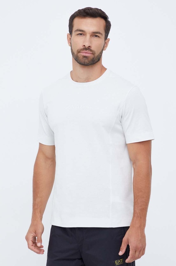 Calvin Klein Performance t-shirt regular beżowy 00GMS3K108