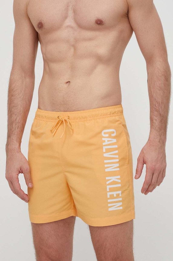 Plavkové šortky Calvin Klein Planet friendly oranžová KM0KM01004