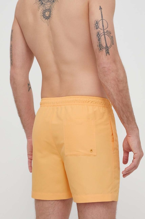 Plavkové šortky Calvin Klein KM0KM01004 oranžová SS24