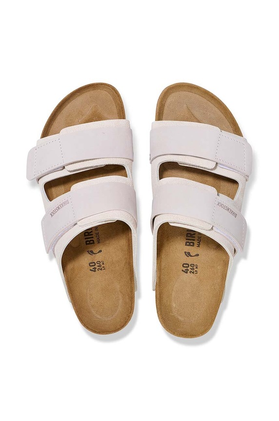 Birkenstock klapki na płaskim obcasie zamszowe Uji 1024800 biały