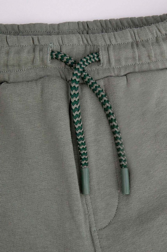CHLAPEC Dětské bavlněné tepláky Coccodrillo WC4120106NAK zelená