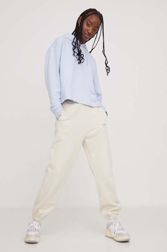 Tommy Jeans spodnie dresowe bawełniane aplikacja beżowy DW0DW17309