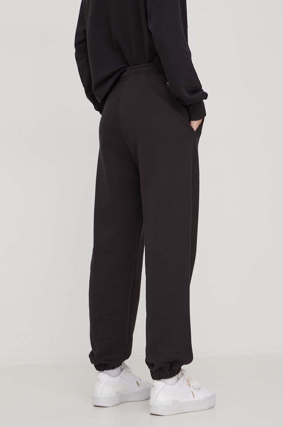 Pamučni donji dio trenirke Tommy Jeans crna DW0DW17309