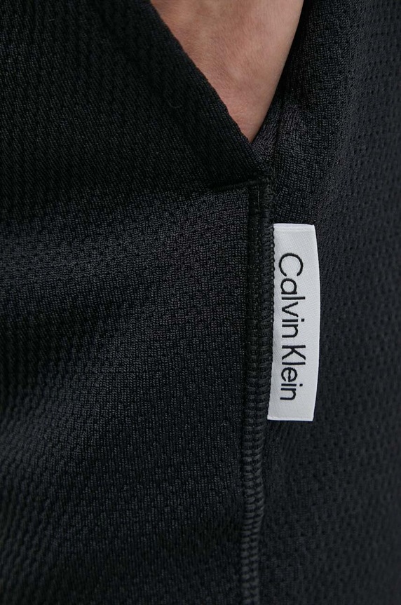 Tréninkové kalhoty Calvin Klein Performance 00GWS4P643 černá