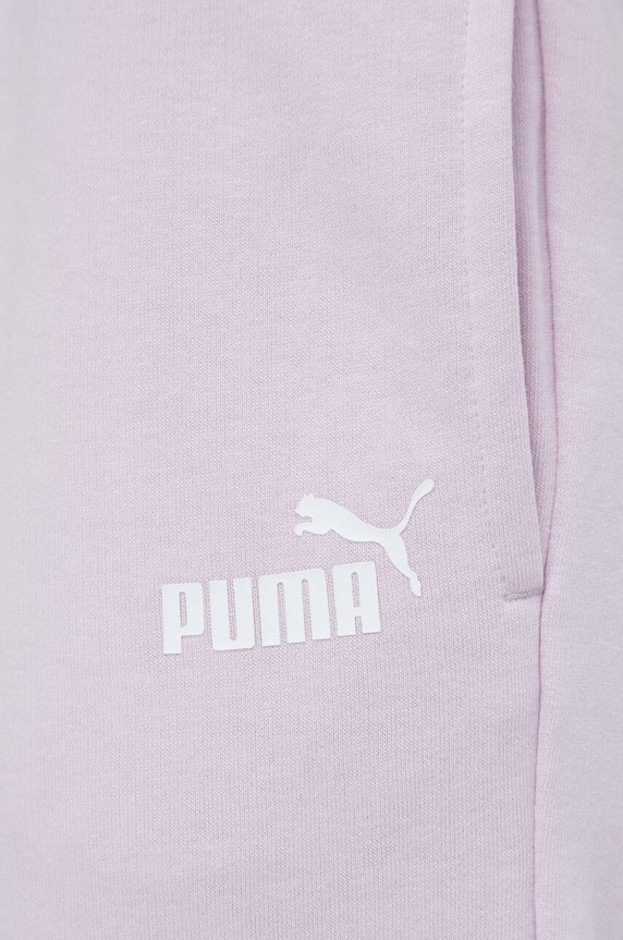 Puma spodnie dresowe fioletowy 678744