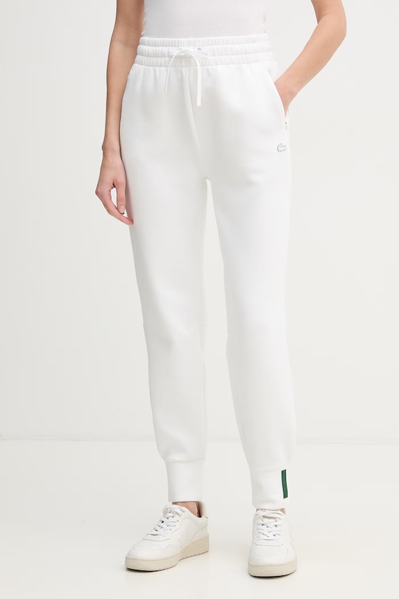 Lacoste spodnie dresowe damskie z bawełną beżowy XF0343