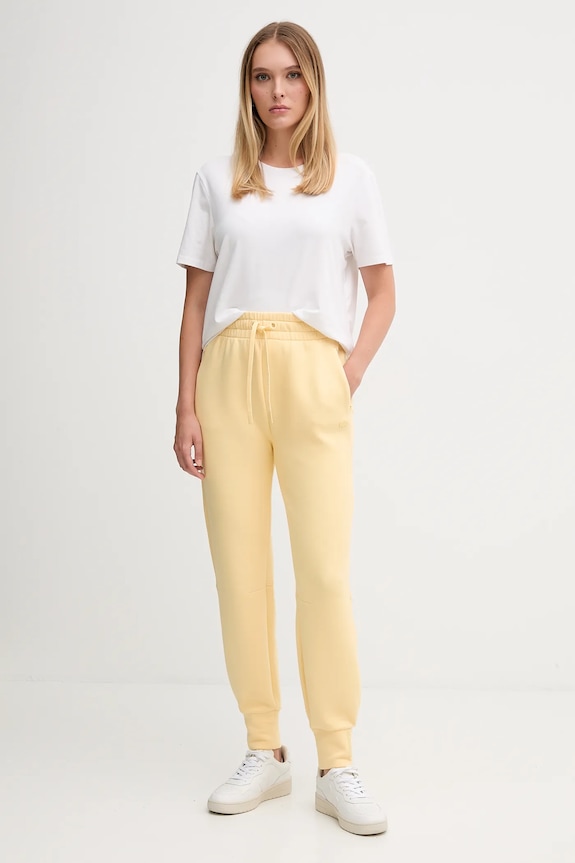 Tepláky Lacoste XF0343 žlutá SS26