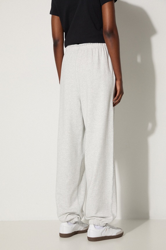 Odzież New Balance spodnie dresowe bawełniane WP41513AHH WP41513AHH szary