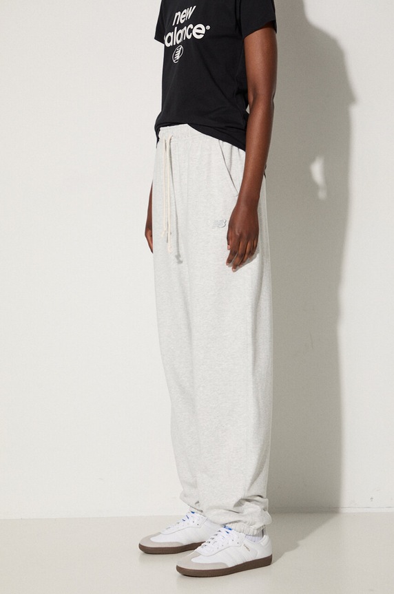 New Balance spodnie dresowe bawełniane WP41513AHH szary WP41513AHH