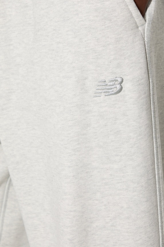 New Balance spodnie dresowe bawełniane WP41513AHH WP41513AHH szary