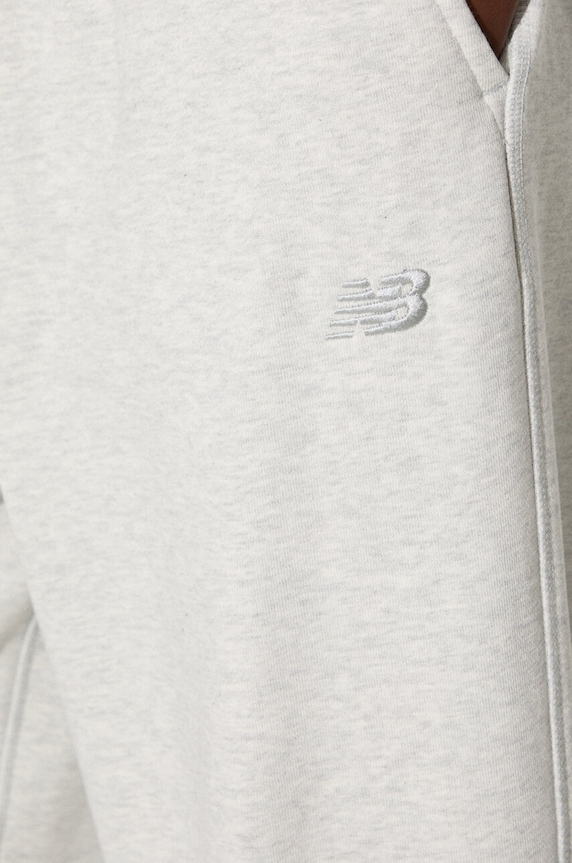 New Balance spodnie dresowe bawełniane WP41513AHH WP41513AHH szary