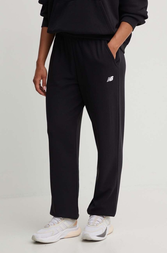 Tepláky New Balance Sport Essentials pletenina černá WP41500BK