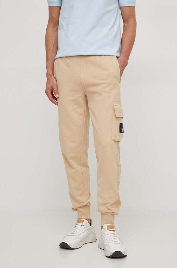 Calvin Klein Jeans spodnie dresowe bawełniane dzianina beżowy J30J324683