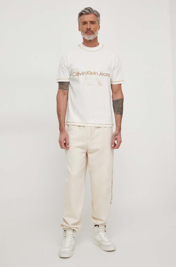 Bavlnené tepláky Calvin Klein Jeans J30J324953 béžová SS24