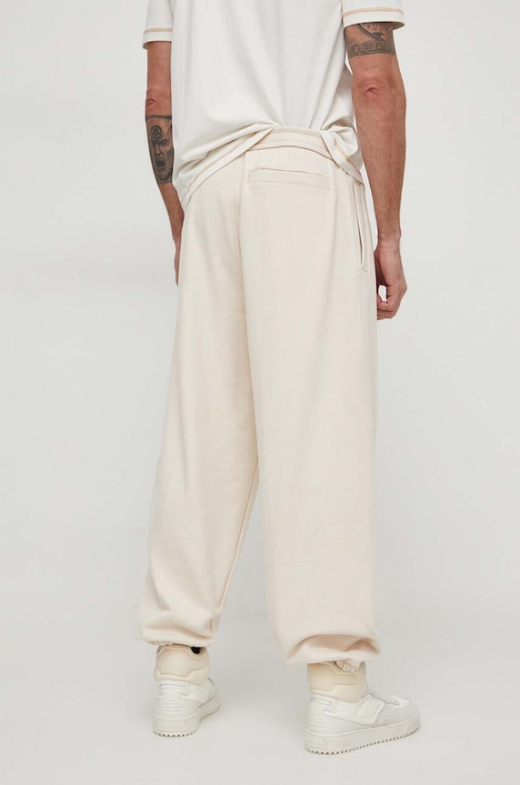 Oblečenie Bavlnené tepláky Calvin Klein Jeans J30J324953 béžová