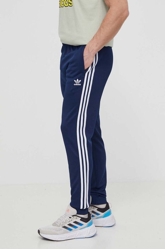 Παντελόνι φόρμας adidas Originals Adicolor Classics SST πλεκτό ύφασμα σκούρο μπλε IR9887