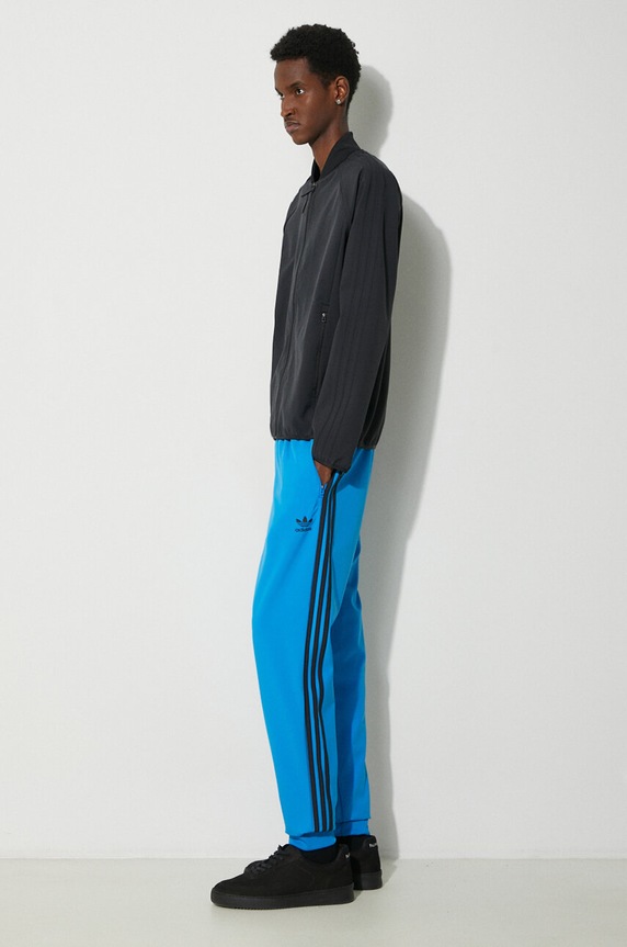 Donji dio trenirke adidas Originals SST Bonded IM9881 plava SS24