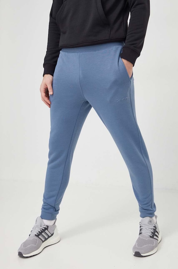 Hlače za trening Calvin Klein Performance bez uzorka plava 00GMS4P634