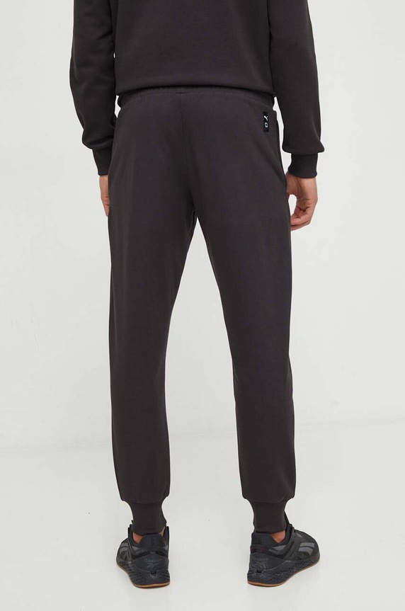 Ρούχα Παντελόνι φόρμας Puma 624813 μαύρο