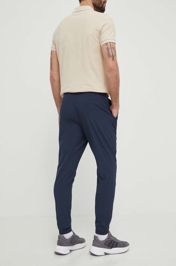 Odzież Helly Hansen spodnie sportowe Roam 63156 granatowy
